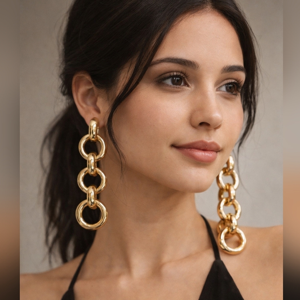 Long earrings made with three interlocking twisted circle pieces